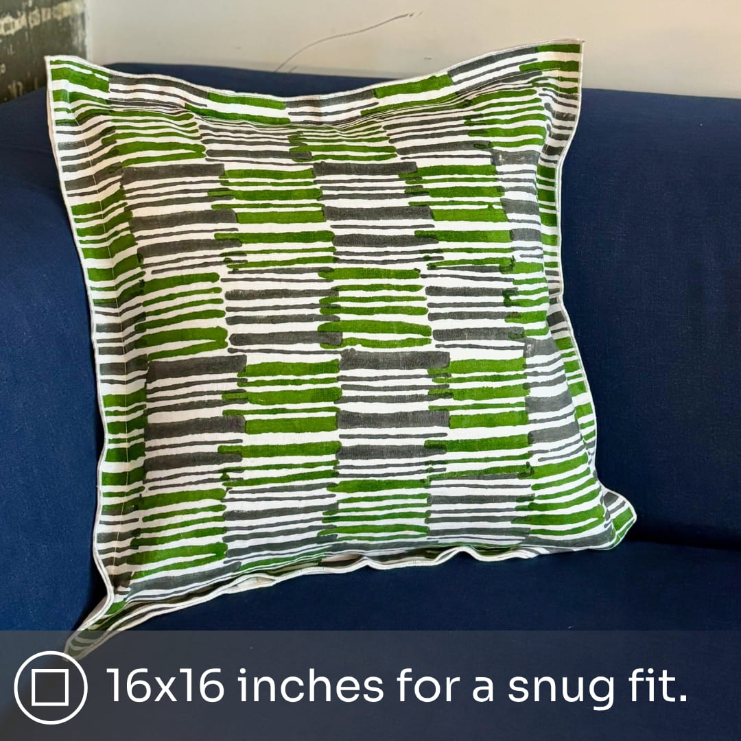 Front view of the Mosswood hand block printed linen cushion cover in kale green, displayed against a plain white background.