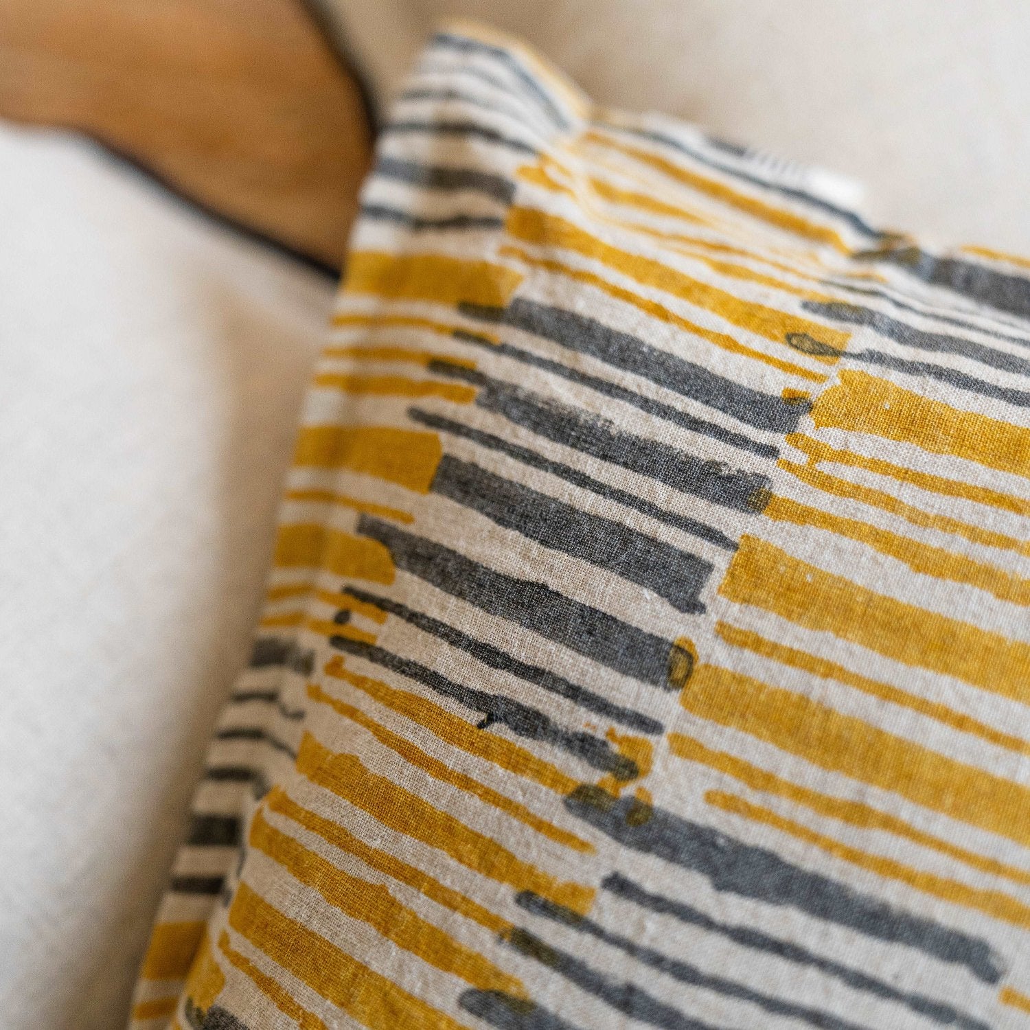 Detailed view of the natural dye used in the Ochrewood pattern, highlighting the eco-friendly aspect of the cushion cover.
