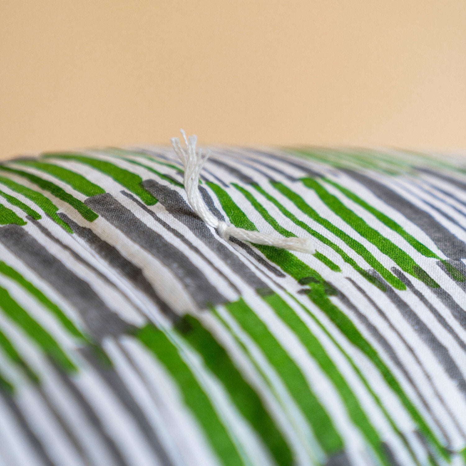 Close-up of Mosswood quilt showcasing detailed hand stitching