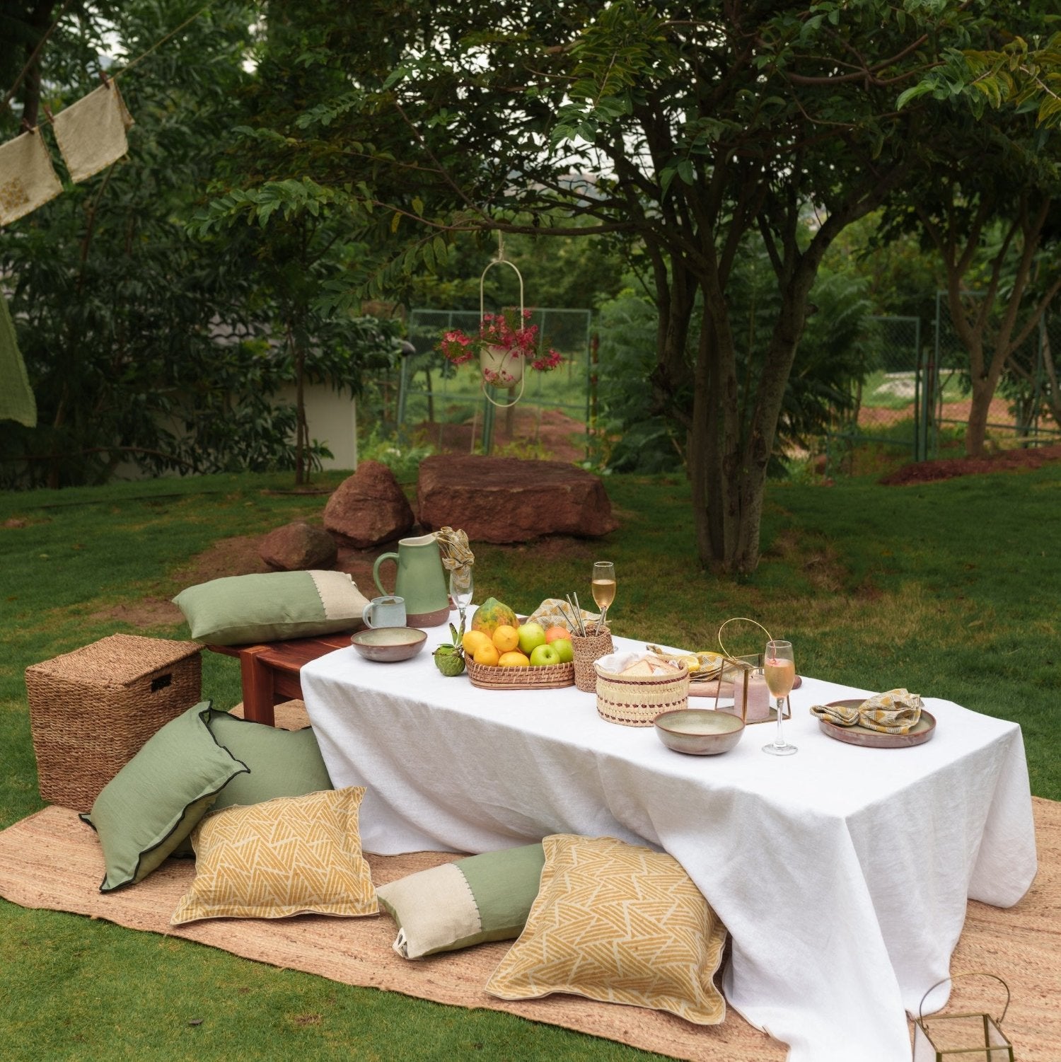 Amberleaf Mustard Ochre Linen Cushion Cover in an aesthetic setting close to nature