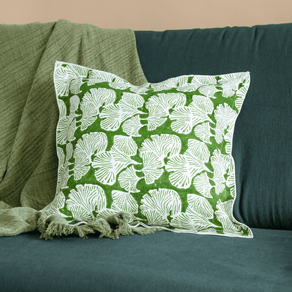 Front view of the Morel hand block printed linen cushion cover in kale green, showcasing intricate floral patterns against a white background.