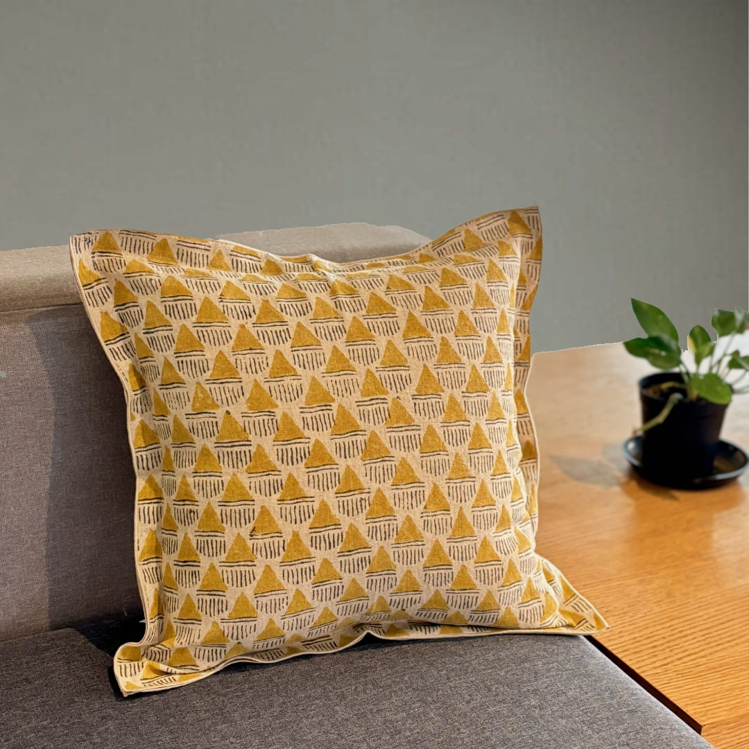 Front view of the Prisma hand block printed linen cushion cover in mustard ochre, displayed against a white background.