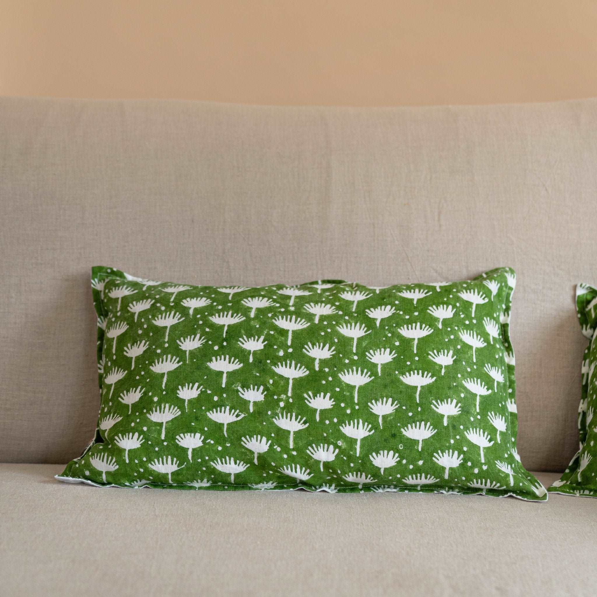 Dahlia hand block printed linen cushion covers in kale green highlighting the floral hand block print