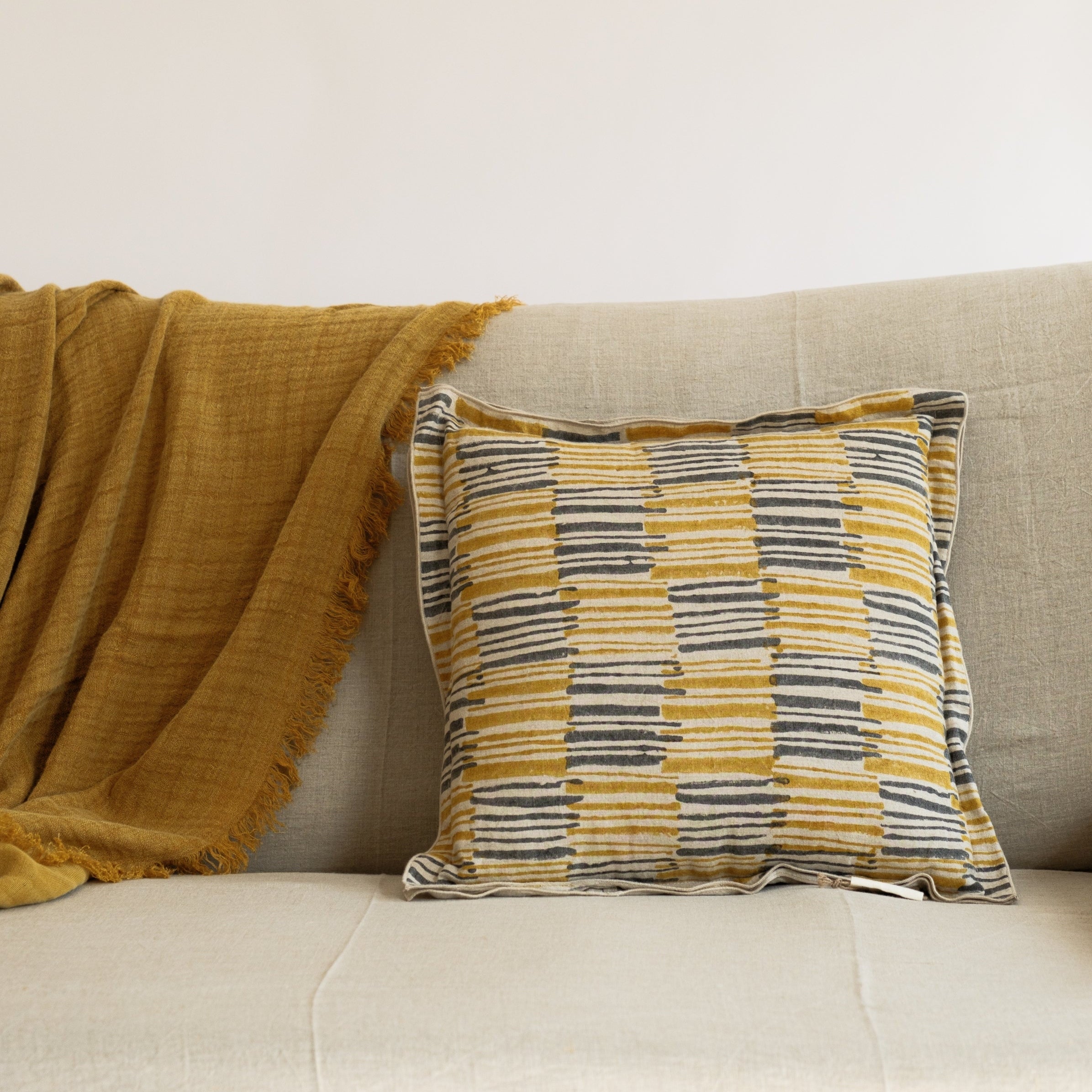 front view of the ochrewood cushion laid out in the aesthetic styling